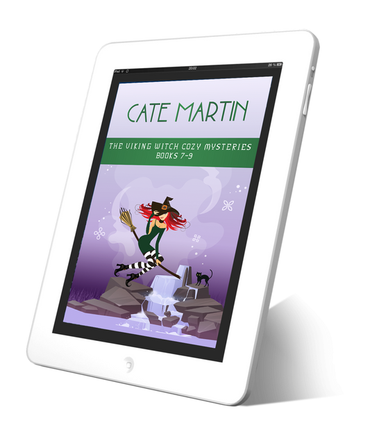 Picture of a tablet displaying the book cover for the collection The Viking Witch Cozy Mysteries Books 7-9. The image is of a witch on a broom. Her cat is in the background standing near a waterfall. Everything is coolly purple.