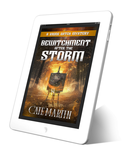 E-reader displaying the book cover of 'Bewitchment After the Storm' by Cate Martin on a white background