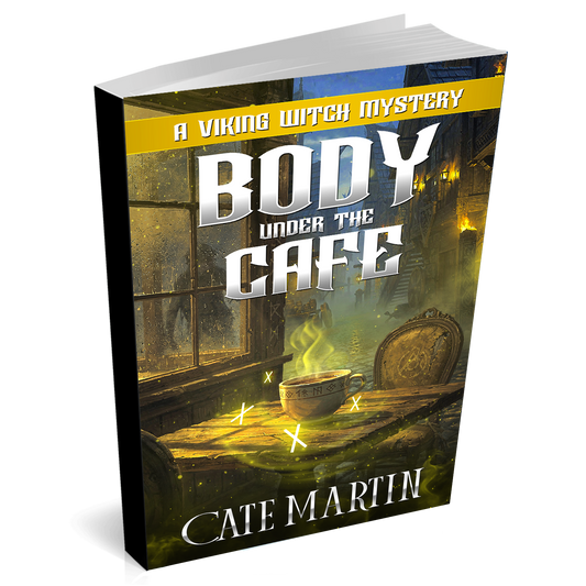 Book cover of 'Body Under the Cafe' by Cate Martin with a Viking theme.