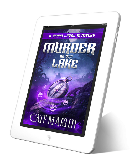 Tablet displaying the book cover of 'Murder on the Lake' by Cate Martin on a white background