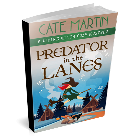 Cover of the paperback book titled Predator in the Lanes. The cover image shows a witch on a broom flying through a village of Viking era houses and pine trees. A black cat is watching her while standing near an orange pathway that winds through the buildings. The mountains in the background are blue.