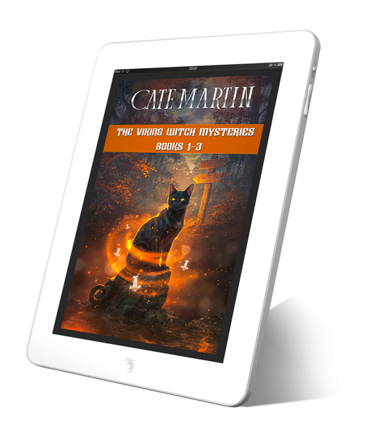 Image of an ebook on a white tablet. The book is titled The Viking Witch Mysteries Books 1-3.