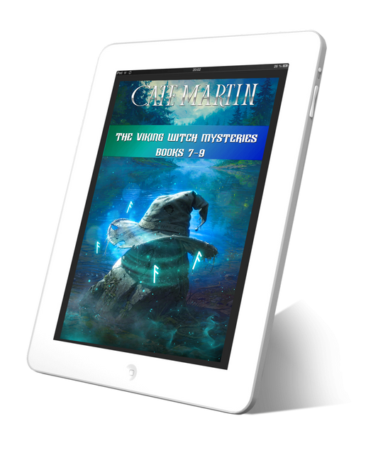 Image is of a book cover displayed on a white tablet. The book is titled The Viking Witch Mysteries Books 7-9.